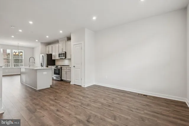 a view of kitchen with wooden floor