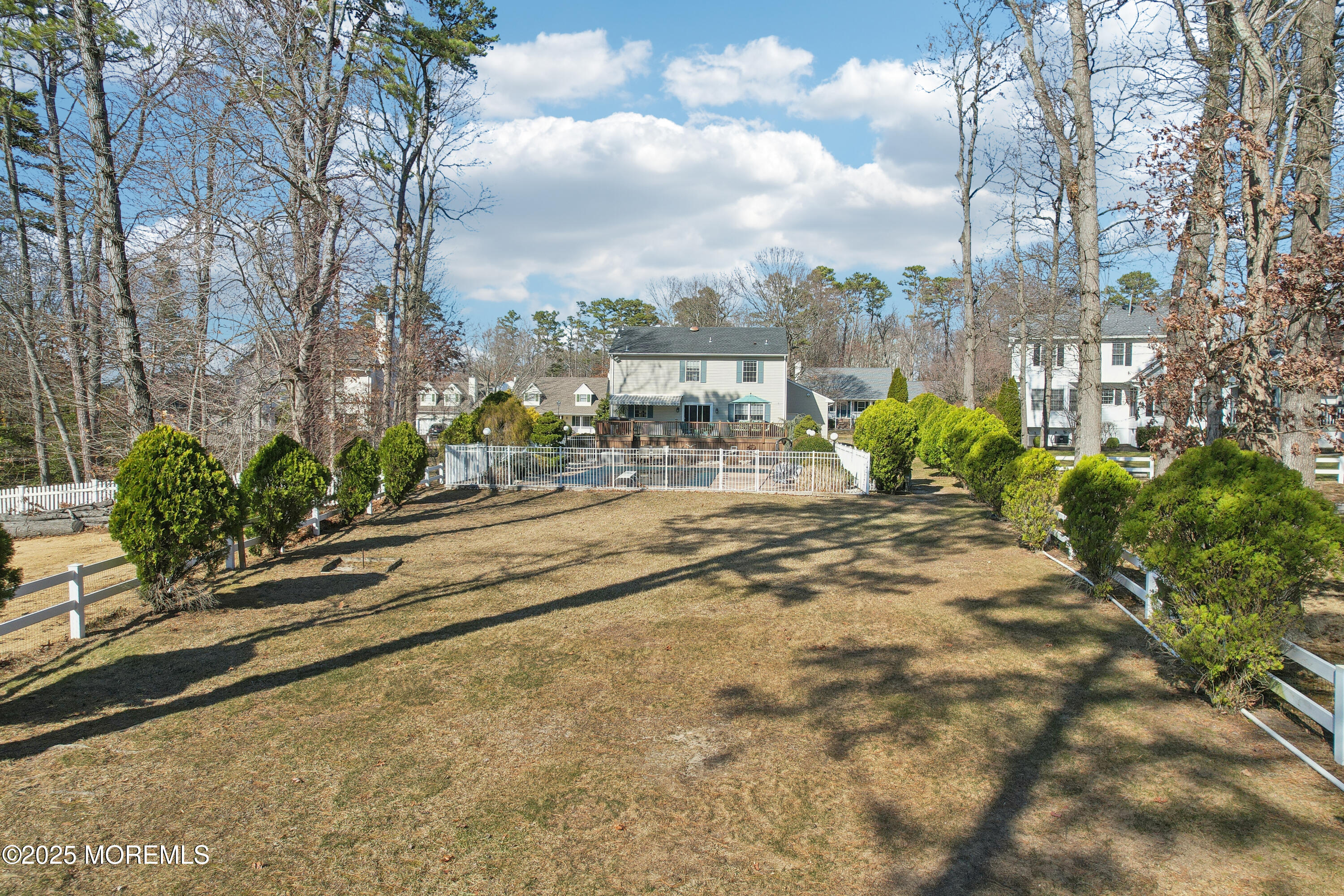 749 Rabbit Run Brick, NJ 08724 - Photo 34 of 43 a view of a yard with plants and trees