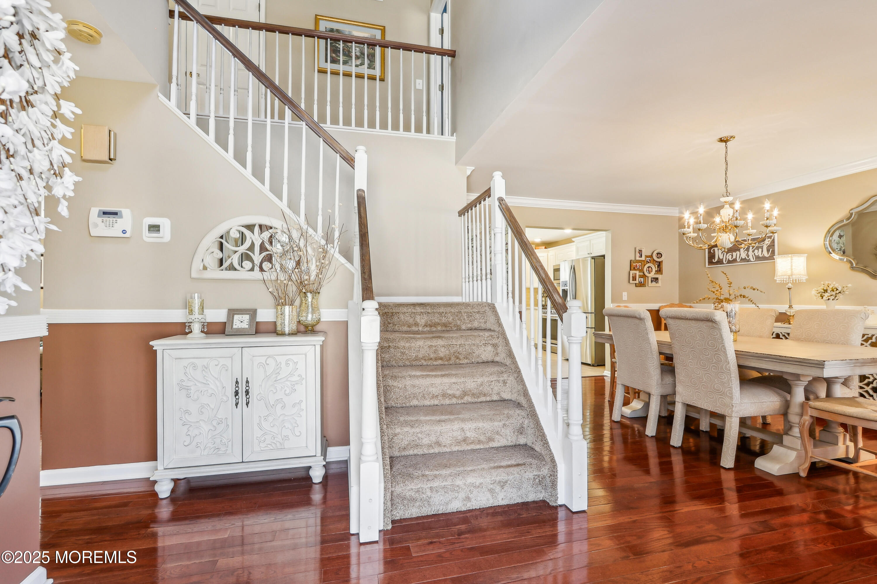 749 Rabbit Run Brick, NJ 08724 - Photo 4 of 43 a view of entryway and hall with wooden floor