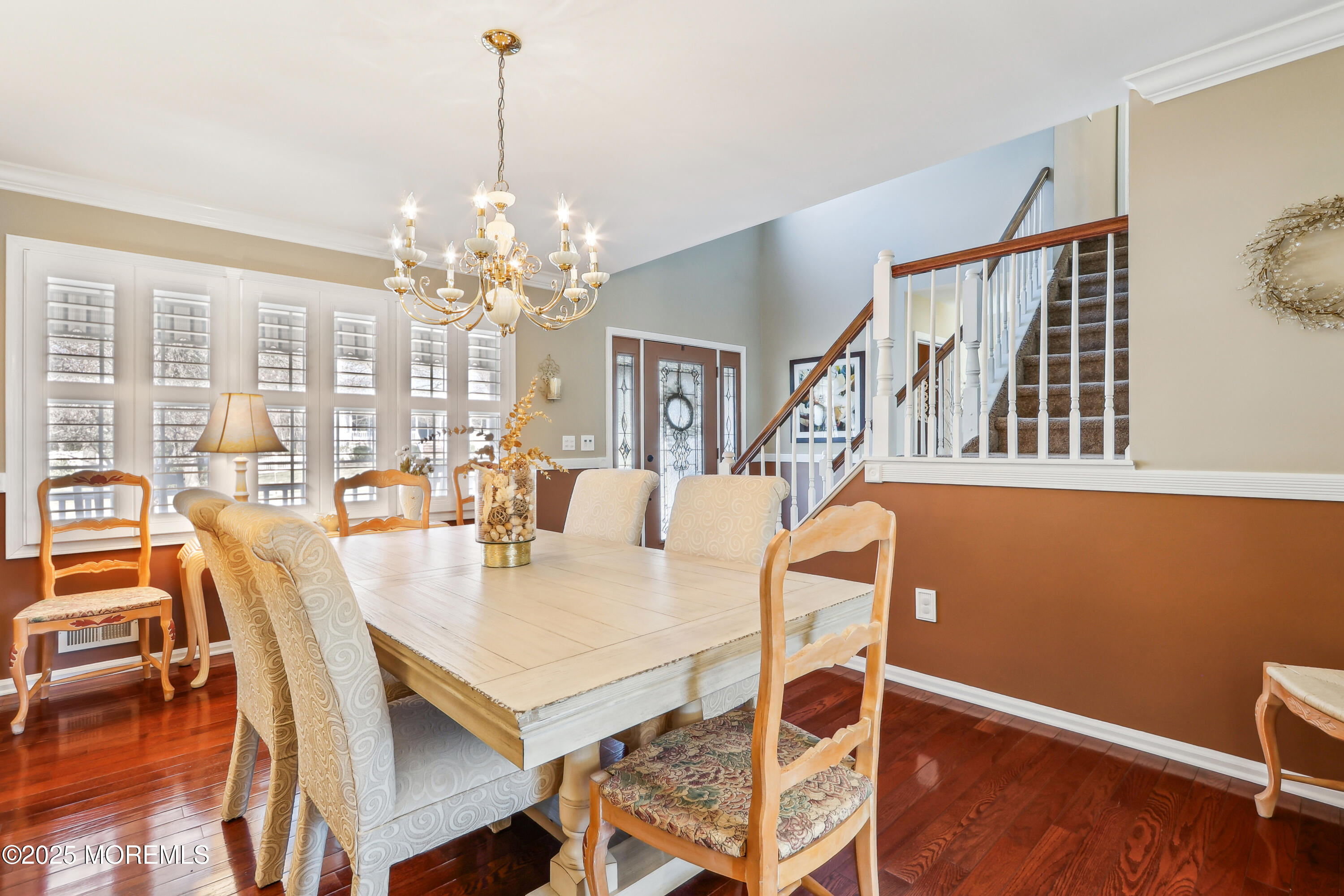 749 Rabbit Run Brick, NJ 08724 - Photo 6 of 43 a view of a dining room with furniture and wooden floor