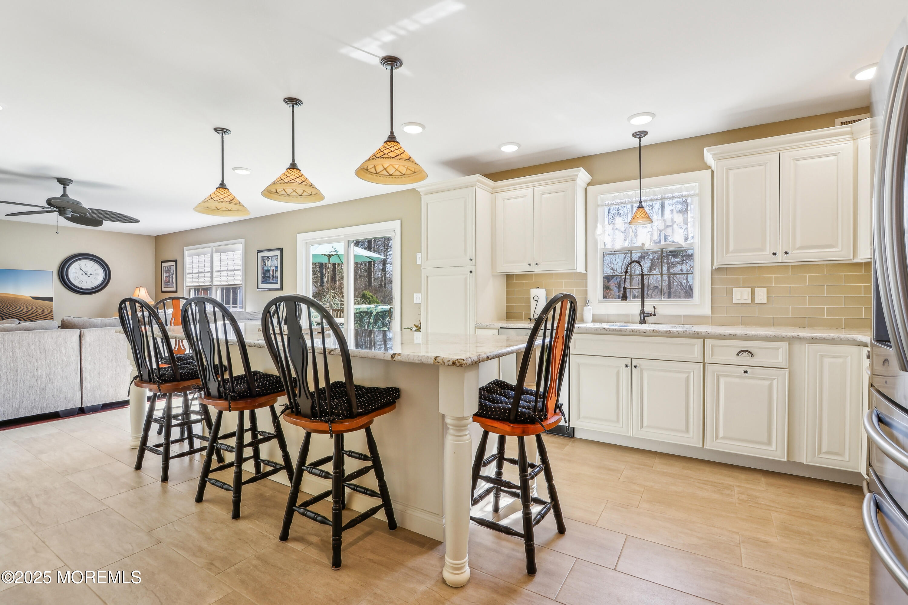 749 Rabbit Run Brick, NJ 08724 - Photo 7 of 43 a view of a dining room with furniture window and outside view