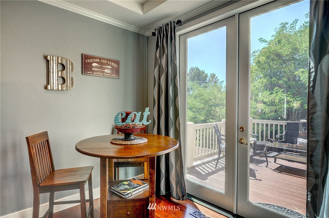 24204 21st Drive Southeast Bothell, WA 98021 - Photo 14 of 39 a dining room with furniture and a window
