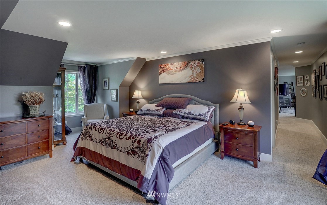 24204 21st Drive Southeast Bothell, WA 98021 - Photo 25 of 39 a bedroom with a bed and lamp with window
