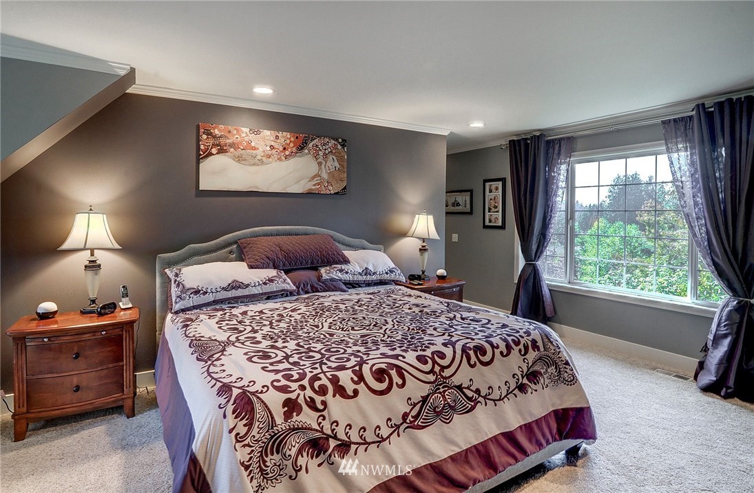 24204 21st Drive Southeast Bothell, WA 98021 - Photo 26 of 39 a bedroom with a bed and window