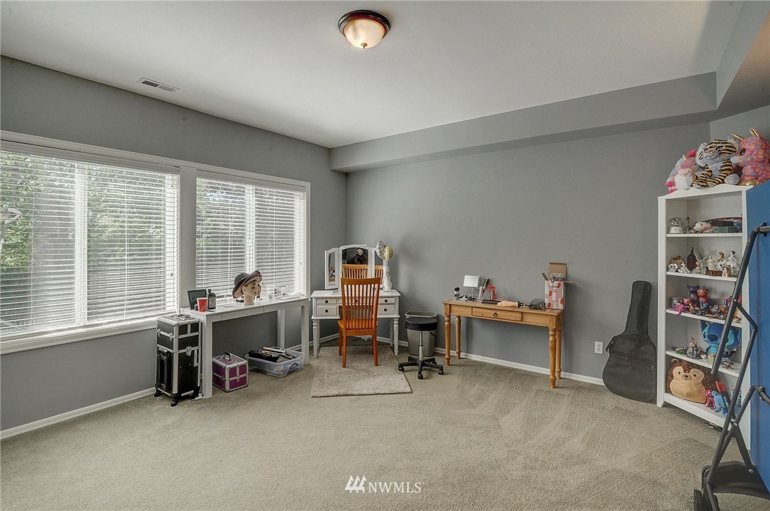 24204 21st Drive Southeast Bothell, WA 98021 - Photo 33 of 39 a view of a workspace with furniture and a window