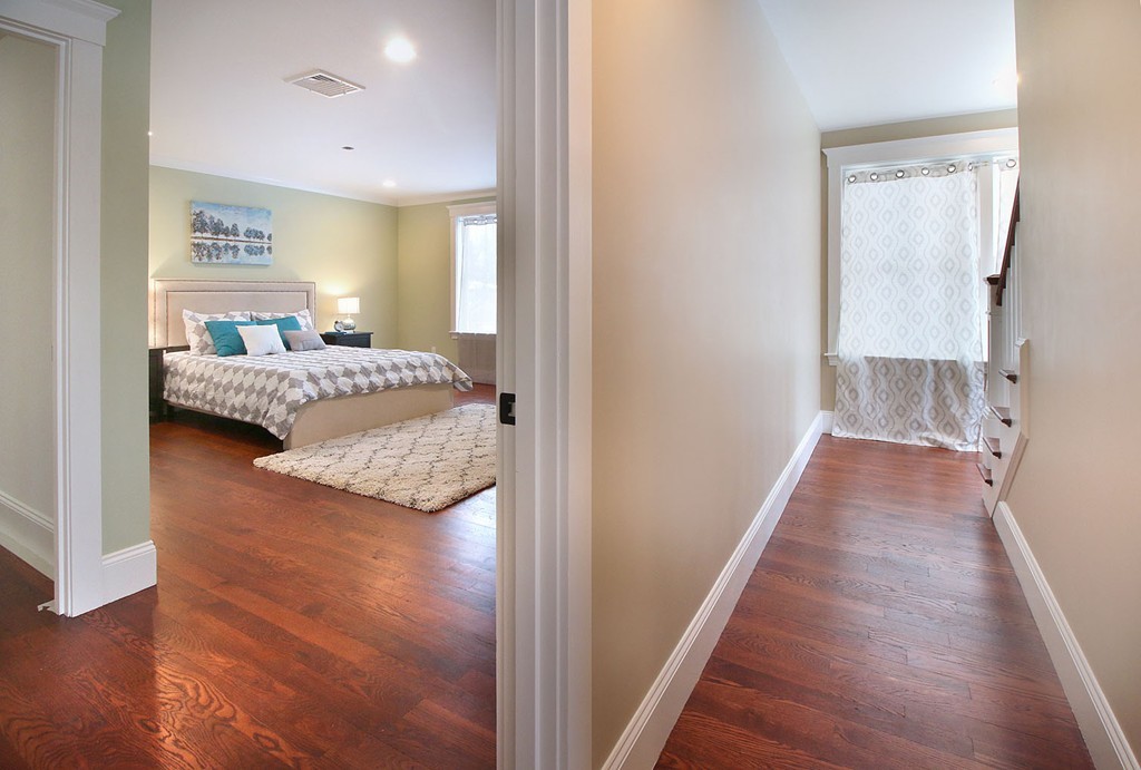 44 Howland Street Needham, MA 02492 - Photo 11 of 18 a bedroom with a bed and wooden floor