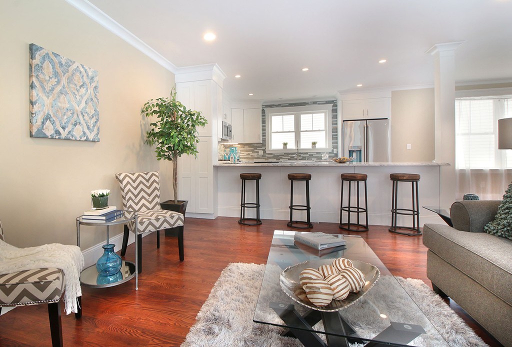 44 Howland Street Needham, MA 02492 - Photo 17 of 18 a living room with furniture and a large window