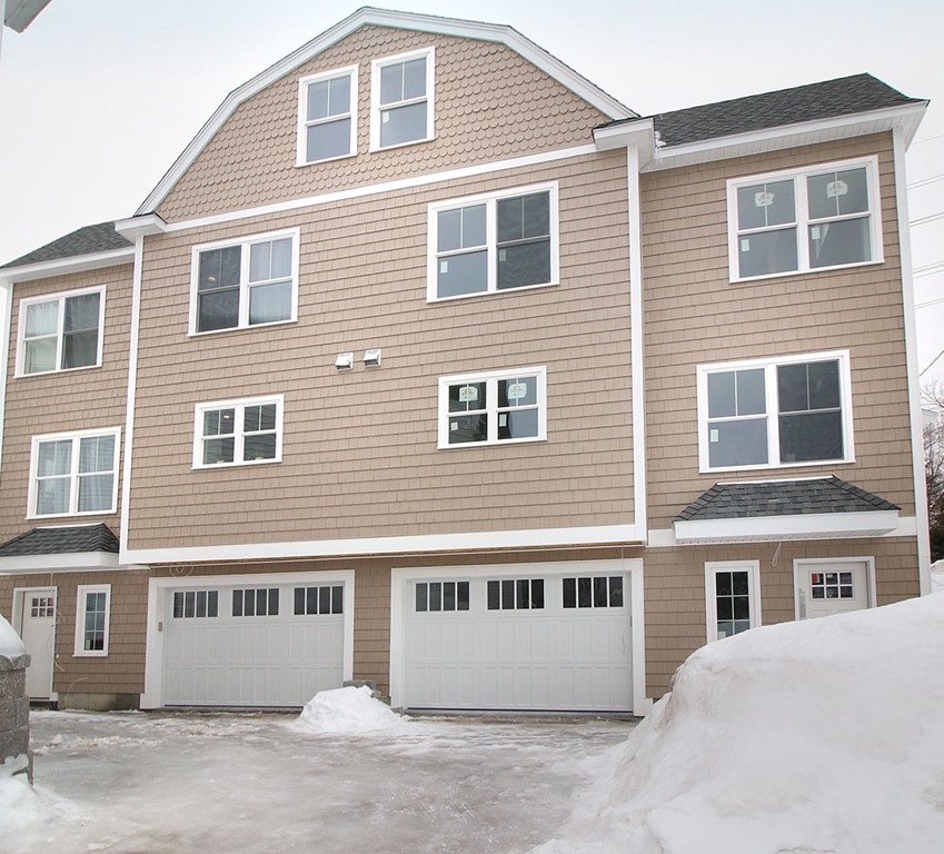 44 Howland Street Needham, MA 02492 - Photo 18 of 18 a front view of a building with a street