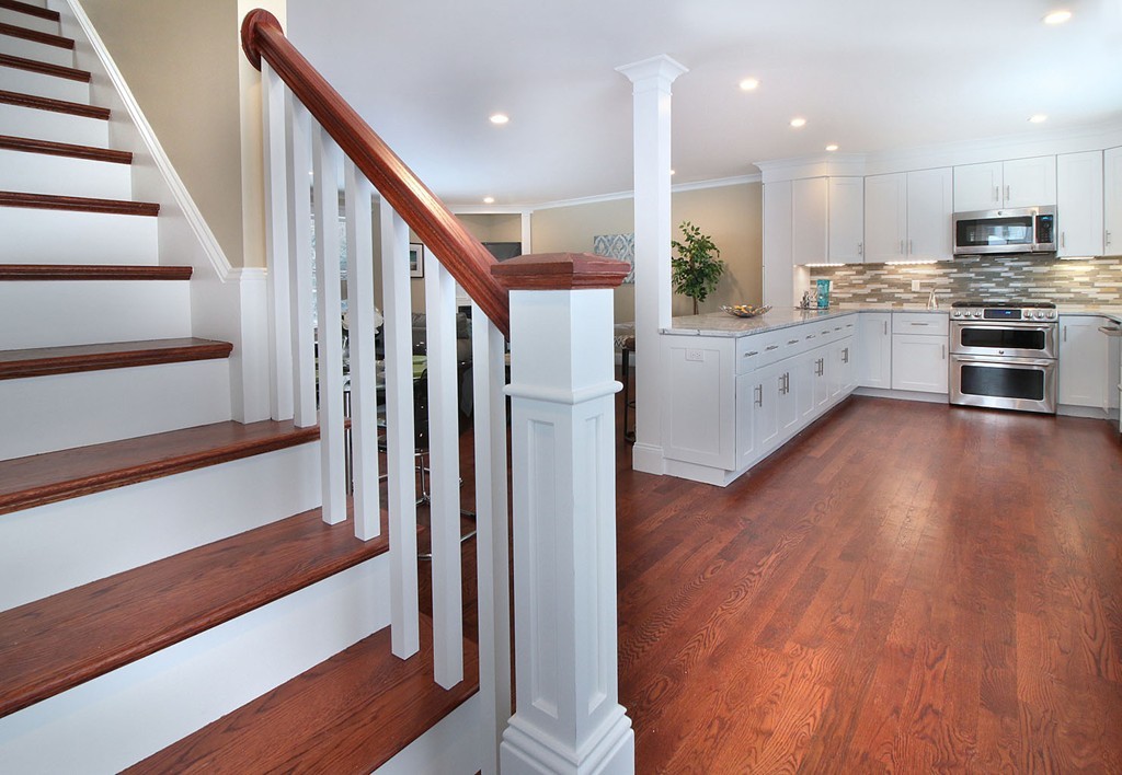 44 Howland Street Needham, MA 02492 - Photo 10 of 18 a view of a kitchen with wooden floor and electronic appliances