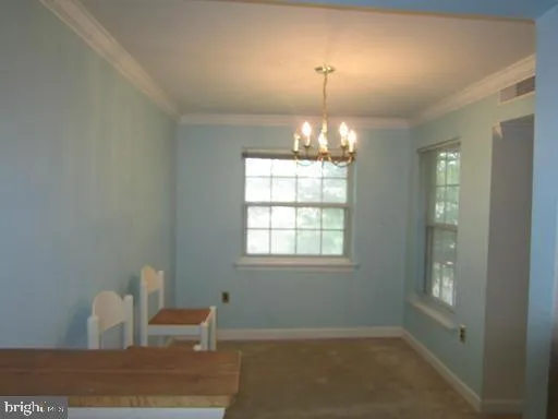 a view of a room with windows