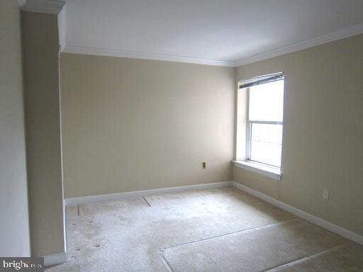 1921 Wilson Lane, Unit 303 McLean, VA 22102 - Photo 8 of 12 an empty room with windows