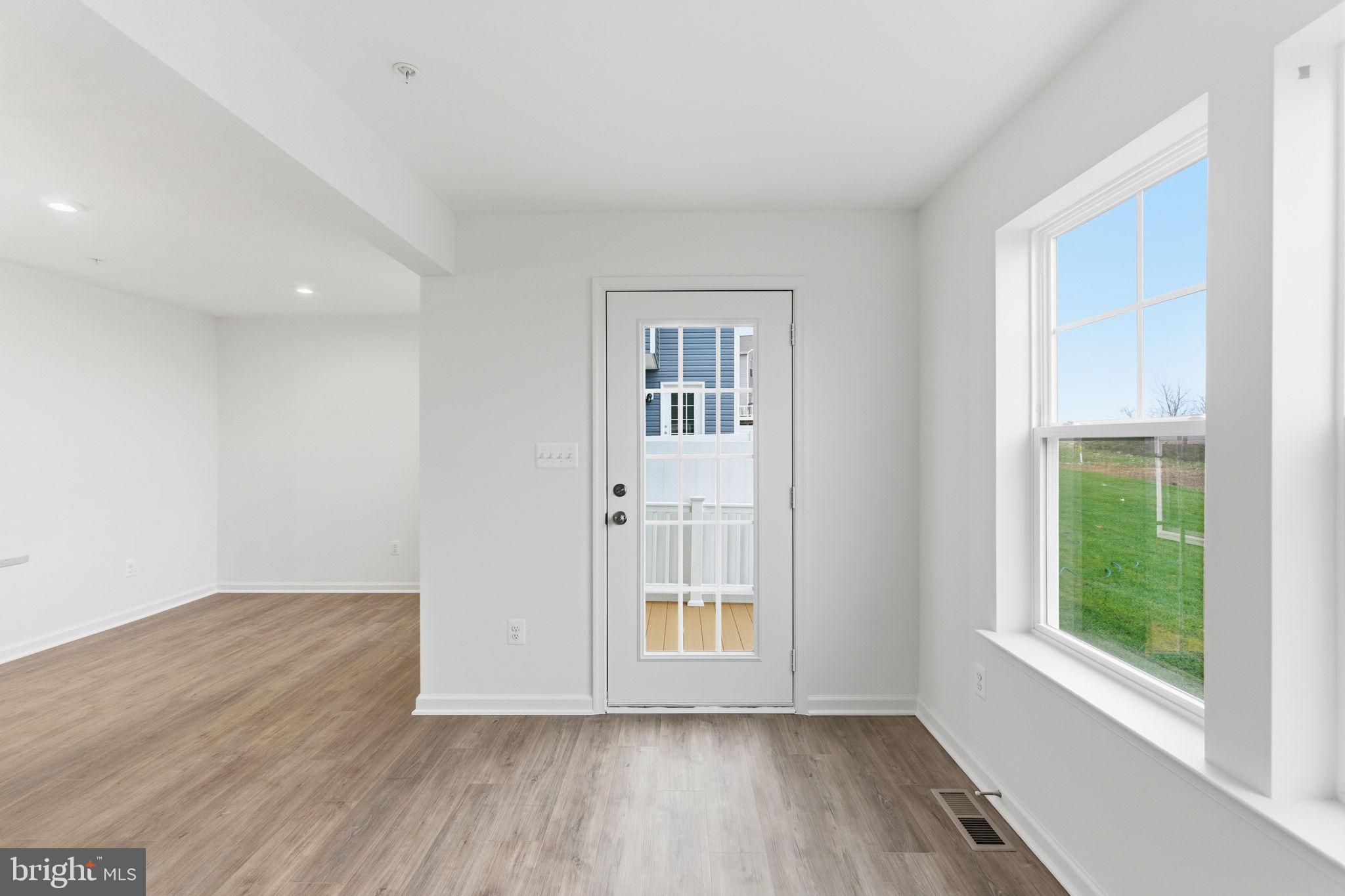 161 Homestead Drive Hanover, PA 17331 - Photo 17 of 43 a view of an empty room with wooden floor and a window