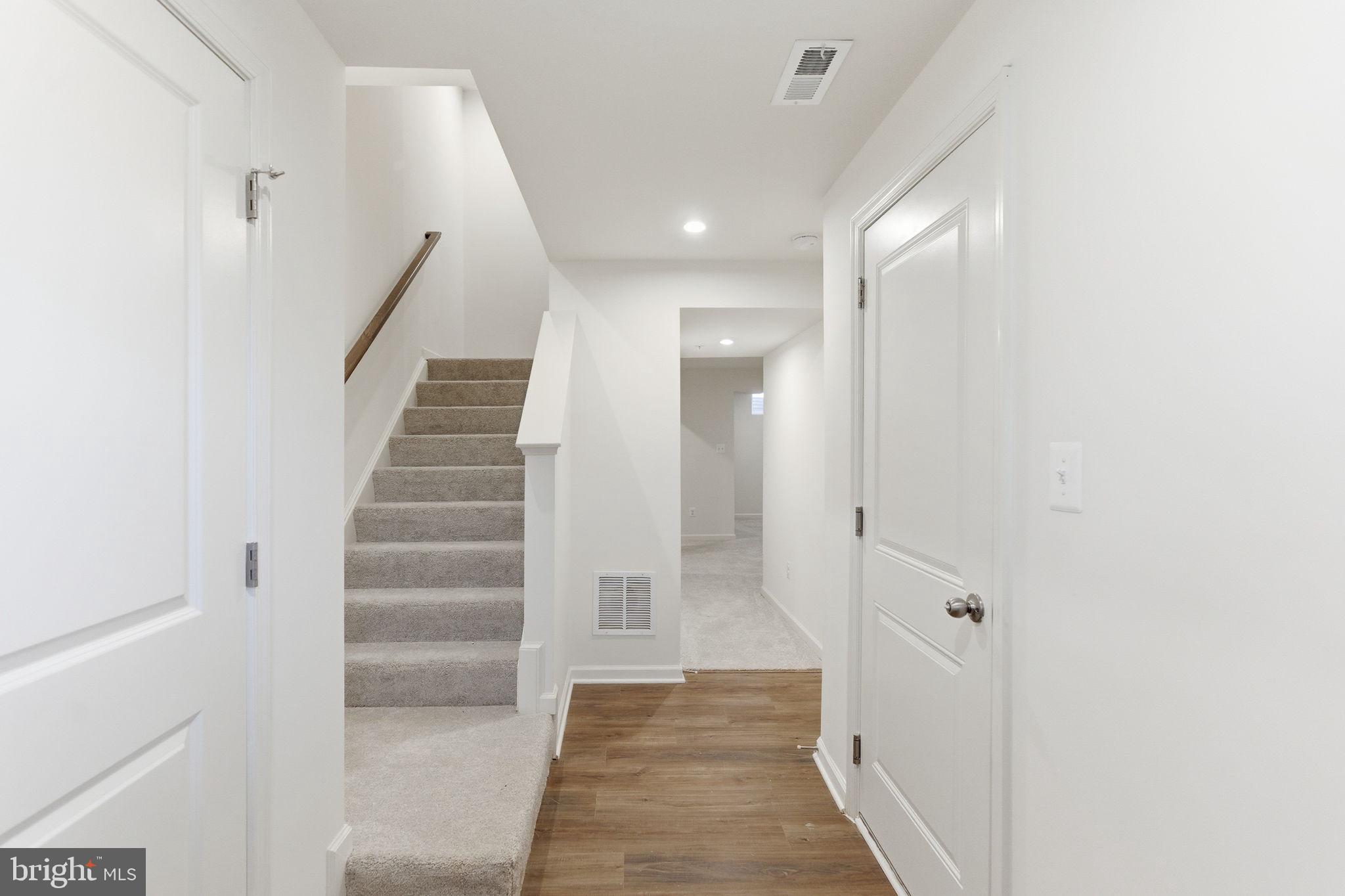 161 Homestead Drive Hanover, PA 17331 - Photo 4 of 43 a view of a hallway with white walls and entryway