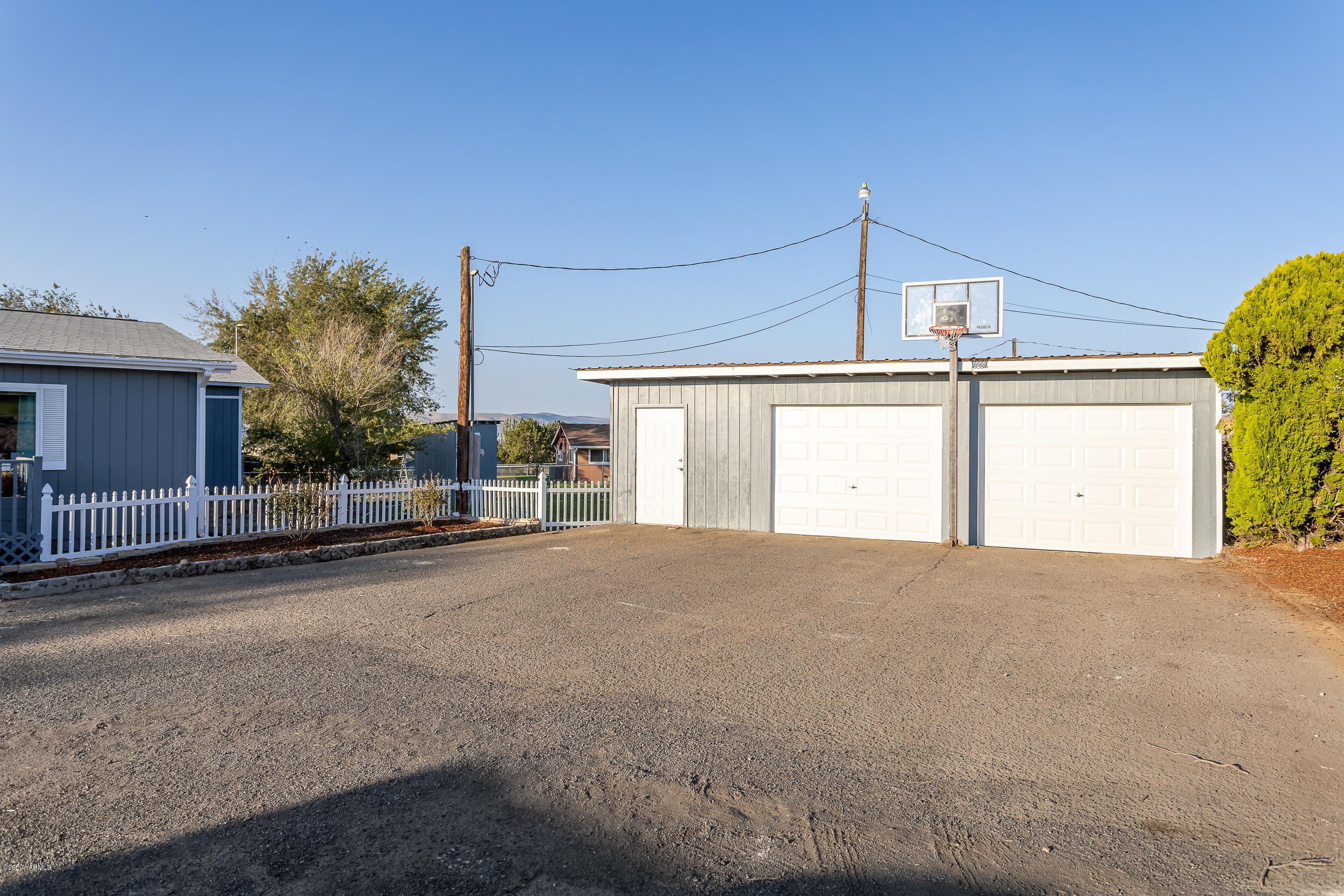 6904 Bittner Road Yakima, WA 98901 - Photo 3 of 29 a view of a house with a outdoor space