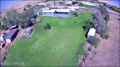 6904 Bittner Road Yakima, WA 98901 - Photo 29 of 29 a aerial view of a house with a yard and lake