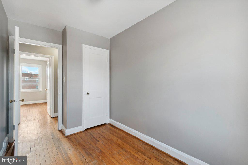 1728 Amuskai Road Baltimore, MD 21234 - Photo 17 of 30 a view of an empty room with wooden floor
