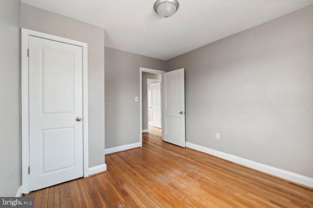 1728 Amuskai Road Baltimore, MD 21234 - Photo 19 of 30 a view of an empty room with wooden floor