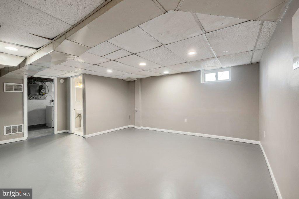 1728 Amuskai Road Baltimore, MD 21234 - Photo 23 of 30 an empty room with a empty space and windows