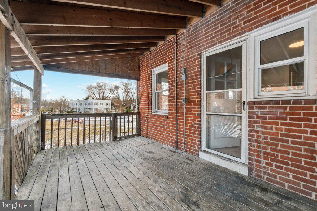 1728 Amuskai Road Baltimore, MD 21234 - Photo 28 of 30 a view of a balcony with wooden floor