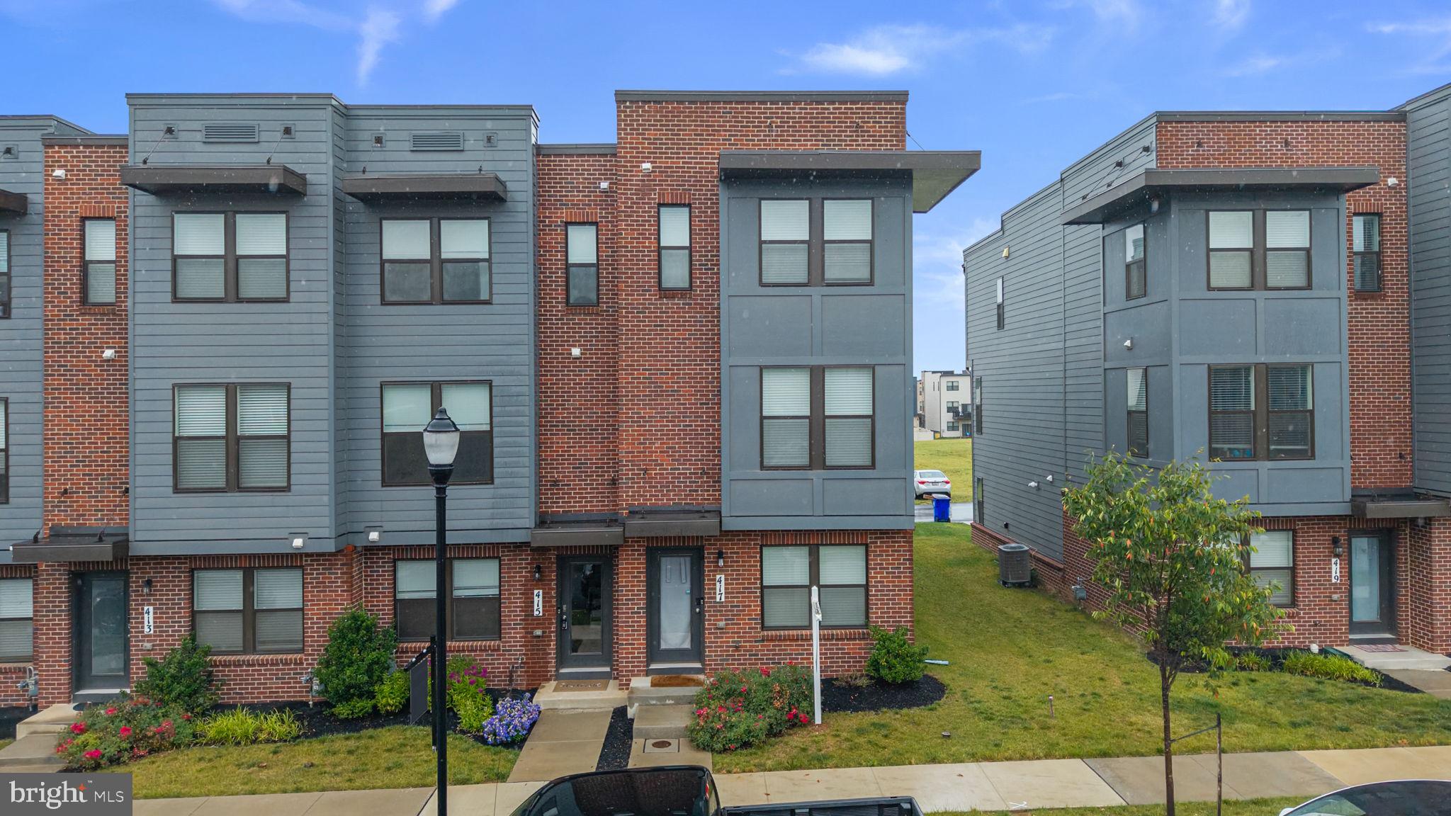 417 Union Street Frederick, MD 21701 - Photo 2 of 35 Modern townhomes with vibrant exteriors.