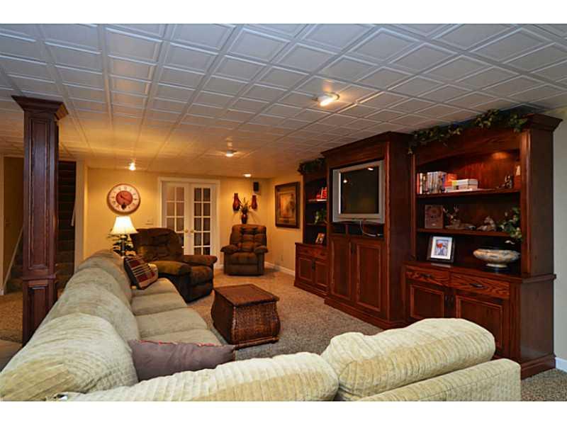1025 Chapel Road Monaca, PA 15061 - Photo 14 of 24 Basement/Game Room. The huge finished basement offers a great place to entertain. A huge 40x20 storage room sits behind the French doors.