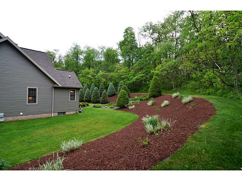 1025 Chapel Road Monaca, PA 15061 - Photo 21 of 24 Yard/Garden. The yard is meticulously landscaped.