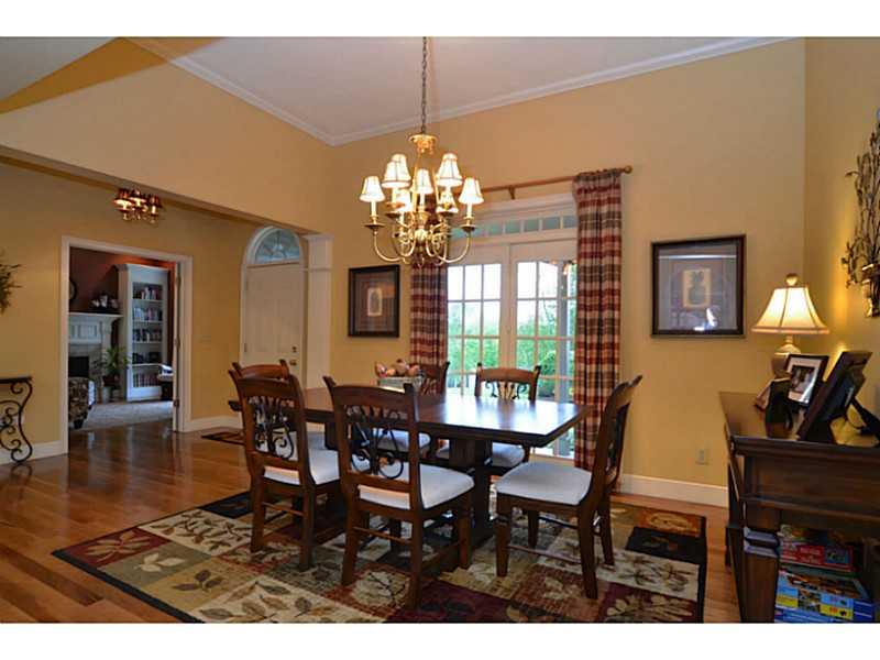 1025 Chapel Road Monaca, PA 15061 - Photo 4 of 24 Dining Room. The dining room includes hardwood floors, crown molding and French doors to the front porch.