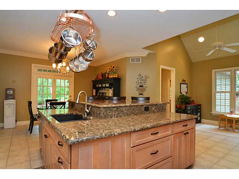 1025 Chapel Road Monaca, PA 15061 - Photo 6 of 24 Kitchen. The kitchen is beautiful! It offers a huge center island, granite, stainless appliances, ceramic tile floors, crown molding and two pantries.
