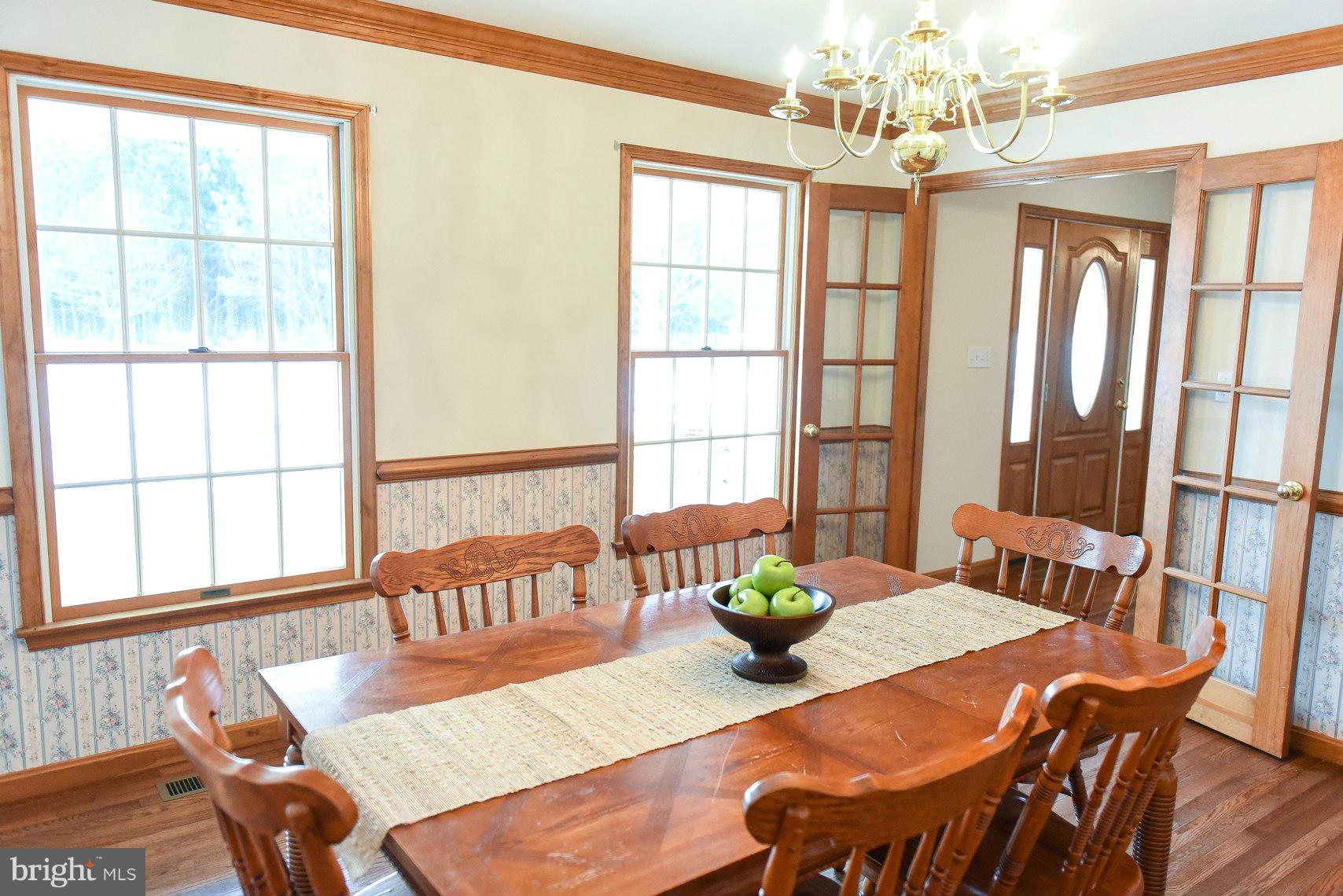12675 Point Lookout Road Ridge, MD 20680 - Photo 9 of 30 Dining Room with Lovely View of the Evergreens