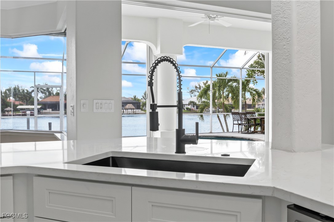 221 Old Burnt Store Road South Cape Coral, FL 33991 - Photo 16 of 49 a close view of kitchen with a sink and cabinets
