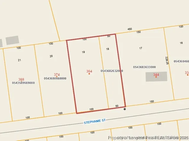 a view of a kitchen with white cabinets and white appliances