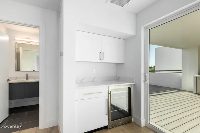 a view of a kitchen from the hallway