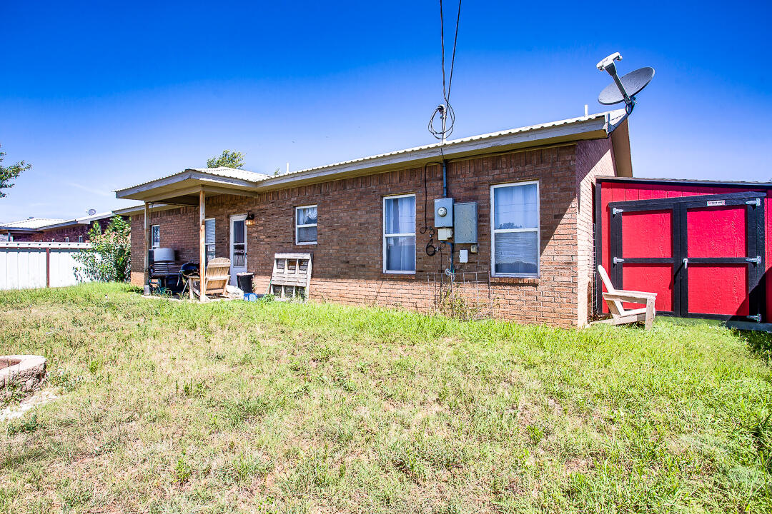 905 11th Street Wolfforth, TX 79382 - Photo 16 of 18 a view of a house with a yard