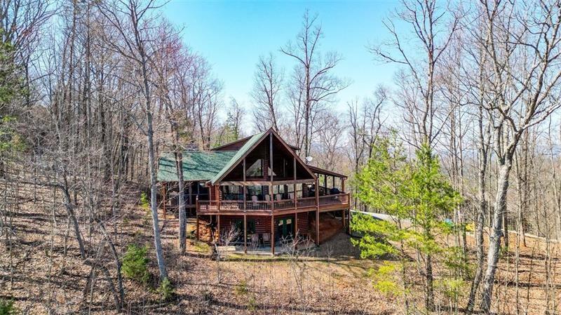 520 Sun Rock Mountain Road Blue Ridge, GA 30513 - Photo 1 of 1 a view of house with a yard