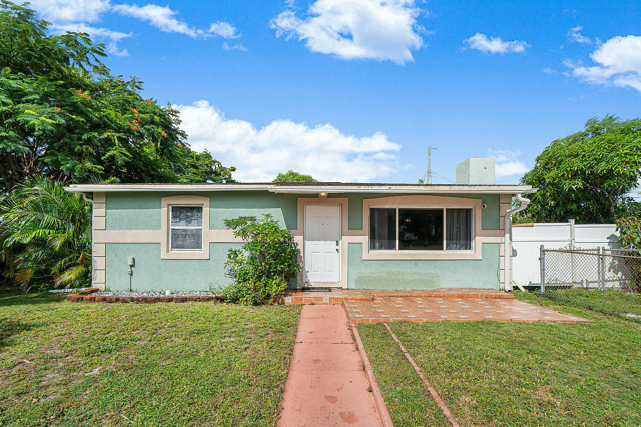 2361 Robin Road West Palm Beach, FL 33409 - Photo 1 of 22 001-2361RobinRd-WestPalmBeach-FL-small