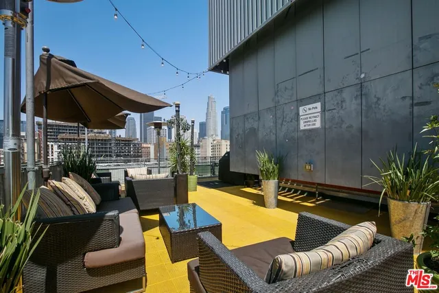a view of a swimming pool with a lounge chair