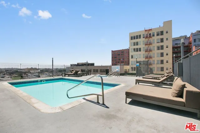 a view of a building with sitting area