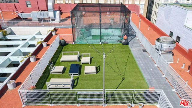 a view of swimming pool with outdoor seating