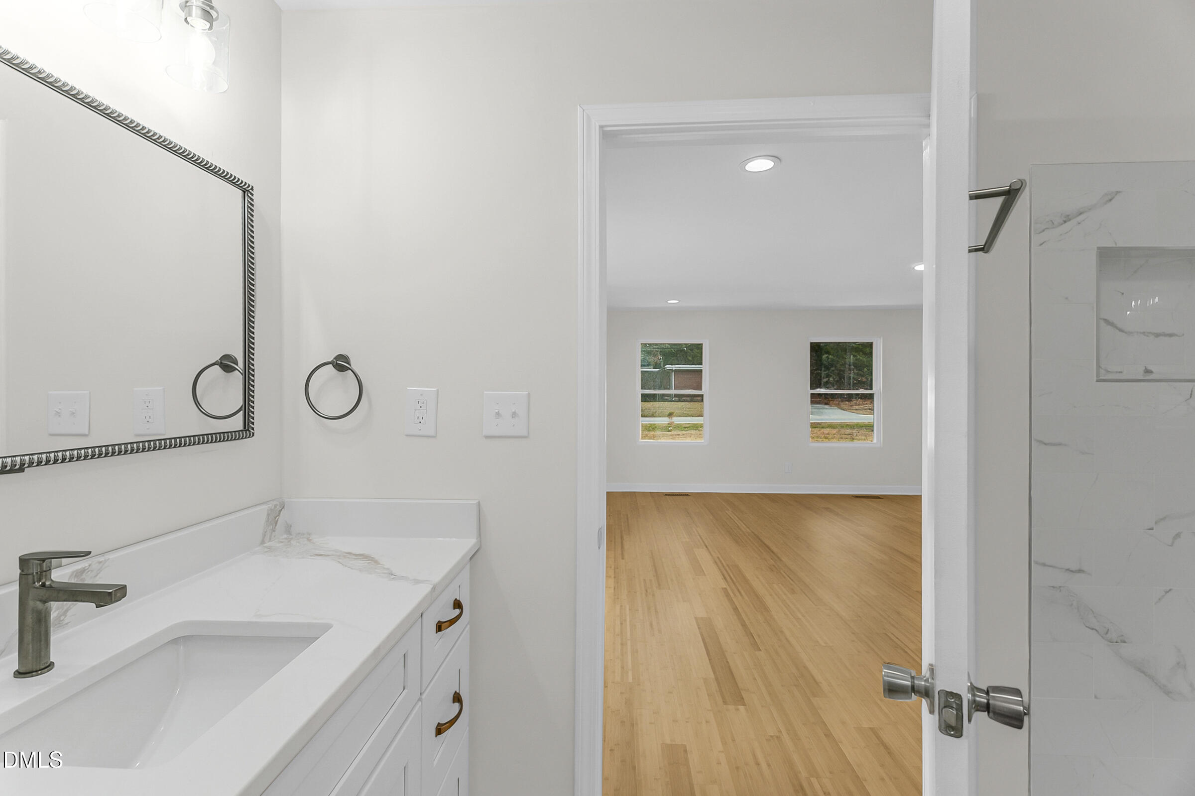 4713 South Nc 87 Graham, NC 27253 - Photo 13 of 35 a bathroom with a sink and a mirror