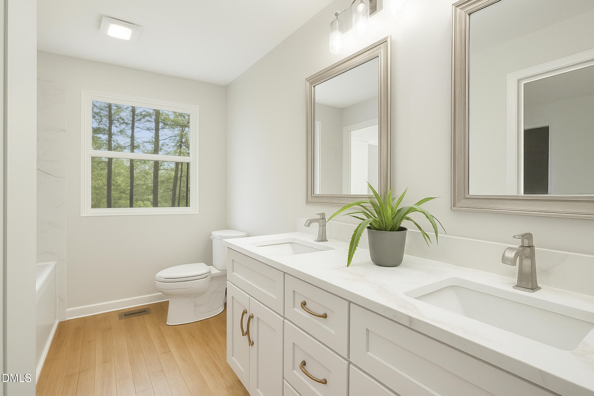 4713 South Nc 87 Graham, NC 27253 - Photo 24 of 35 a bathroom with a granite countertop sink mirror vanity and toilet