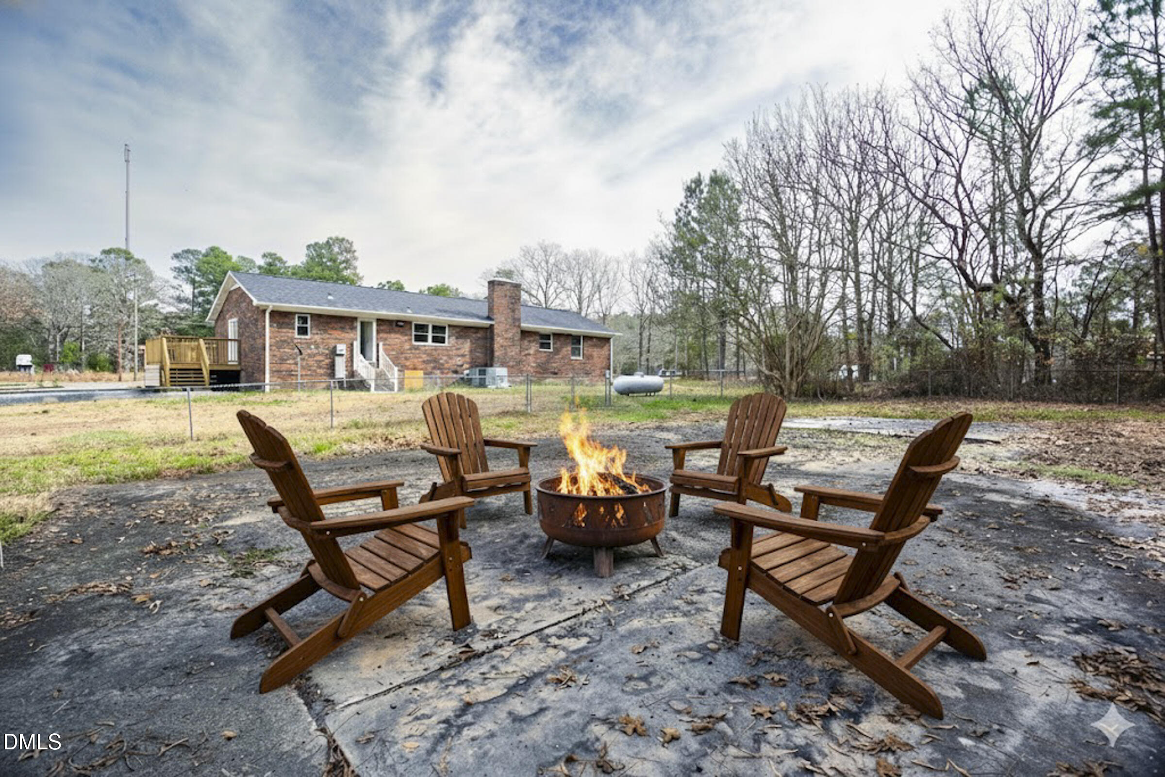 4713 South Nc 87 Graham, NC 27253 - Photo 28 of 35 a view of a patio with couple of chairs