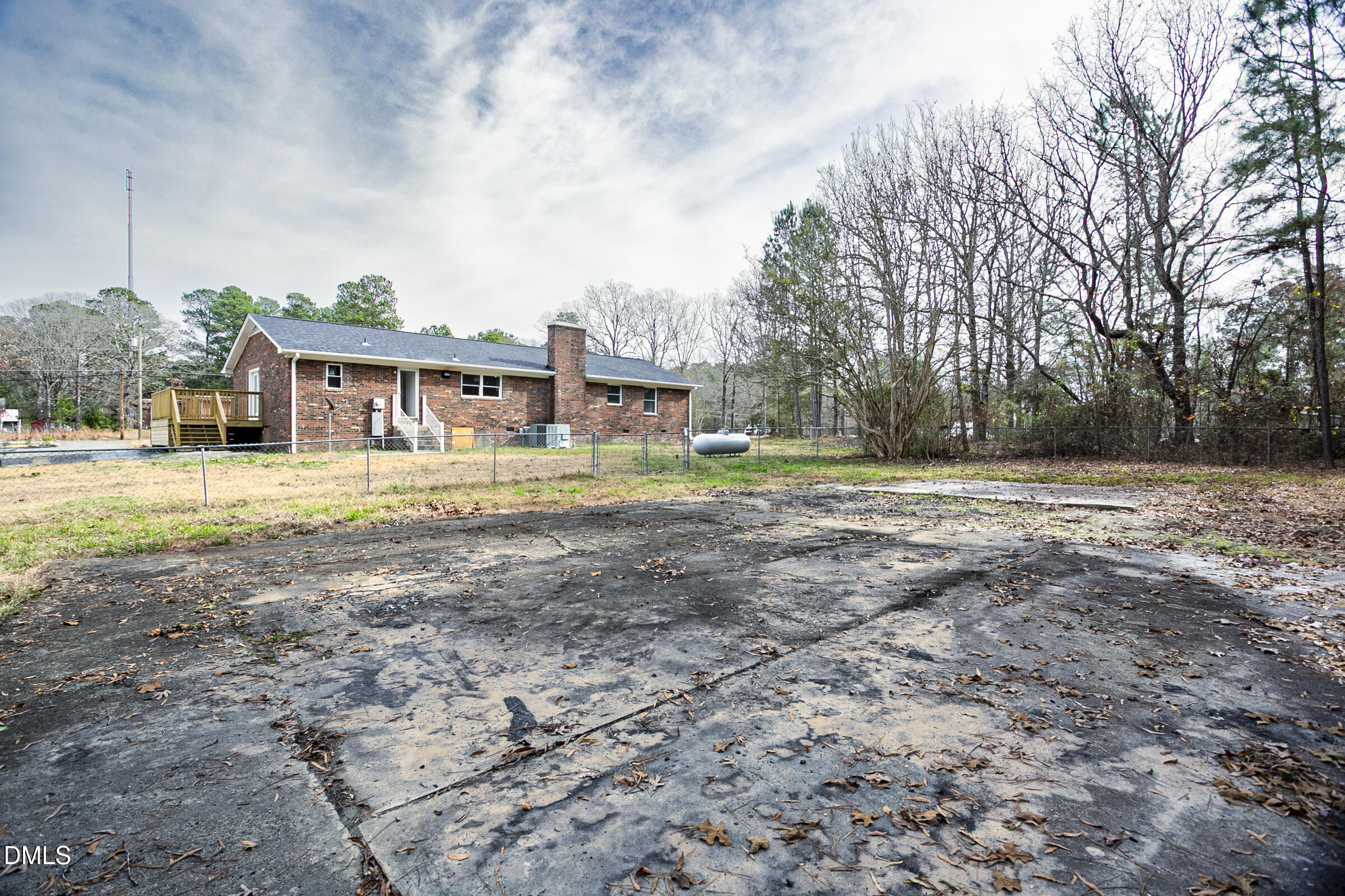 4713 South Nc 87 Graham, NC 27253 - Photo 29 of 35 a front view of residential houses with yard and trees