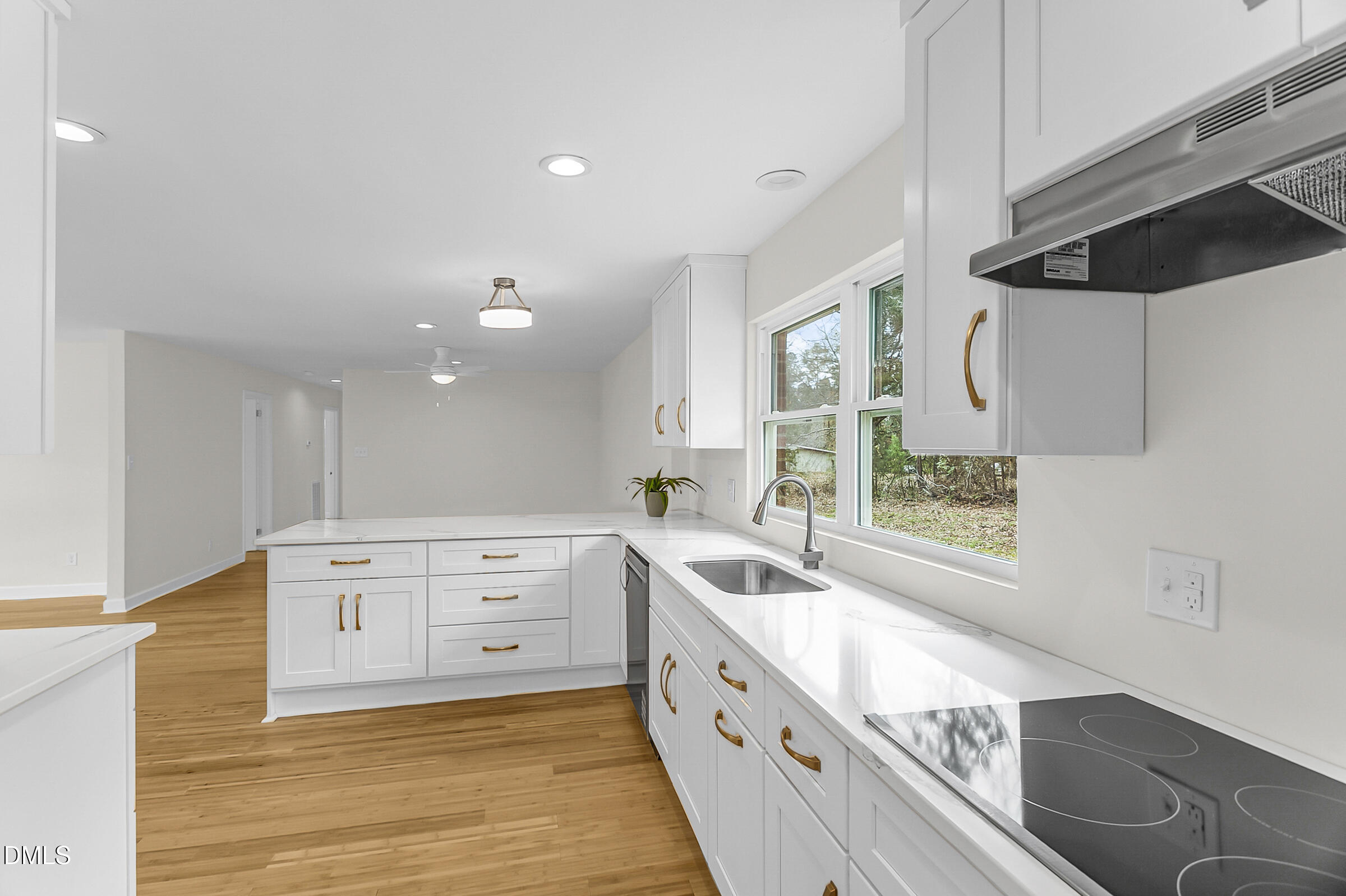 4713 South Nc 87 Graham, NC 27253 - Photo 10 of 35 a large white kitchen with a large window