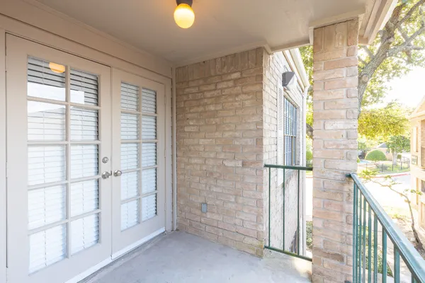 a view of a room with windows