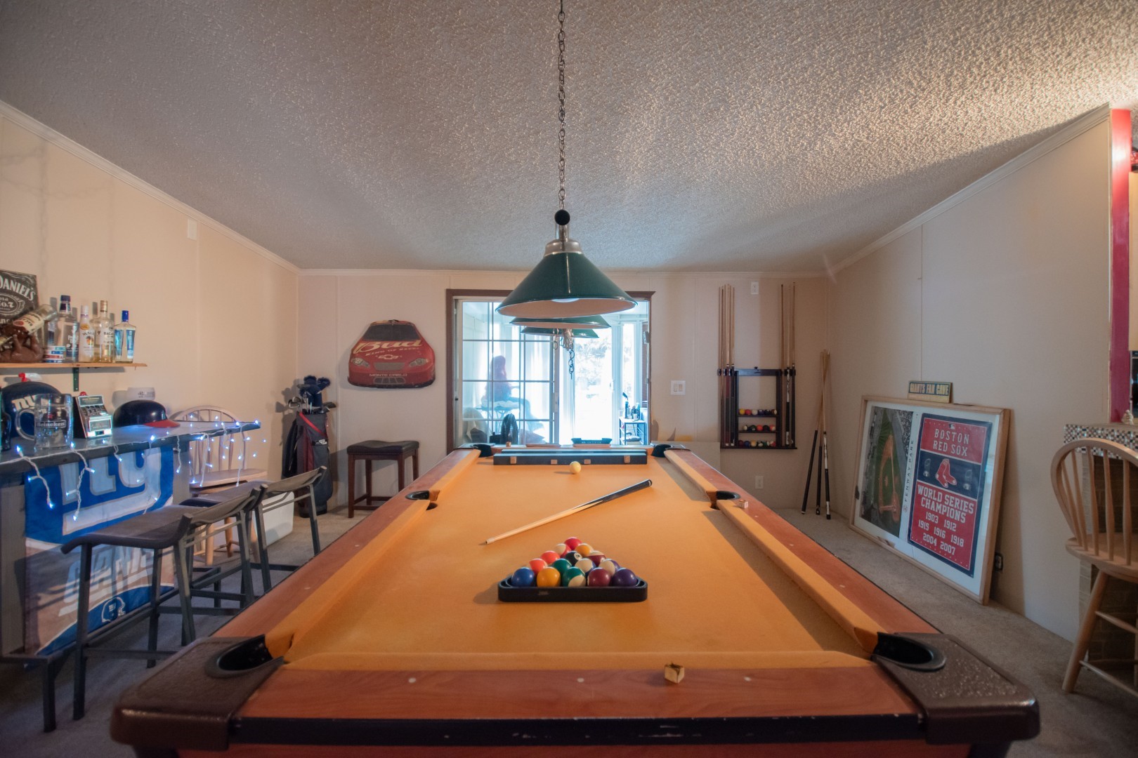 85216 Lina Road Fernandina Beach, FL 32034 - Photo 24 of 47 a room with pool table windows and a chandelier