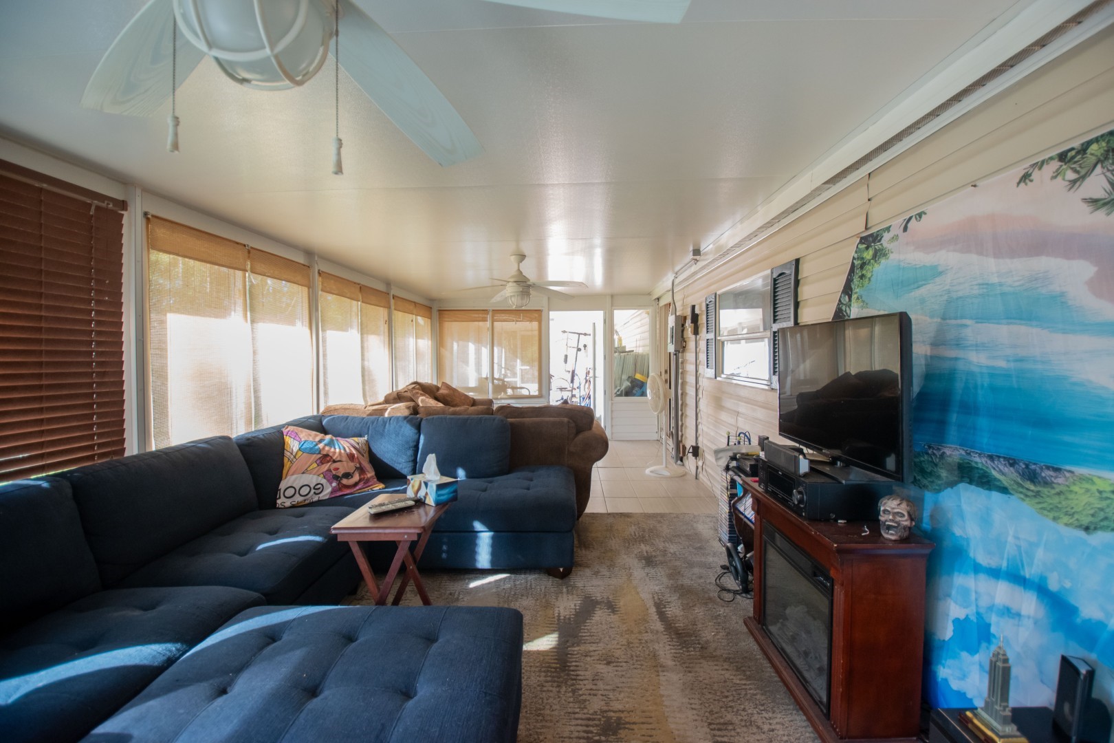 85216 Lina Road Fernandina Beach, FL 32034 - Photo 26 of 47 a living room with furniture and a flat screen tv