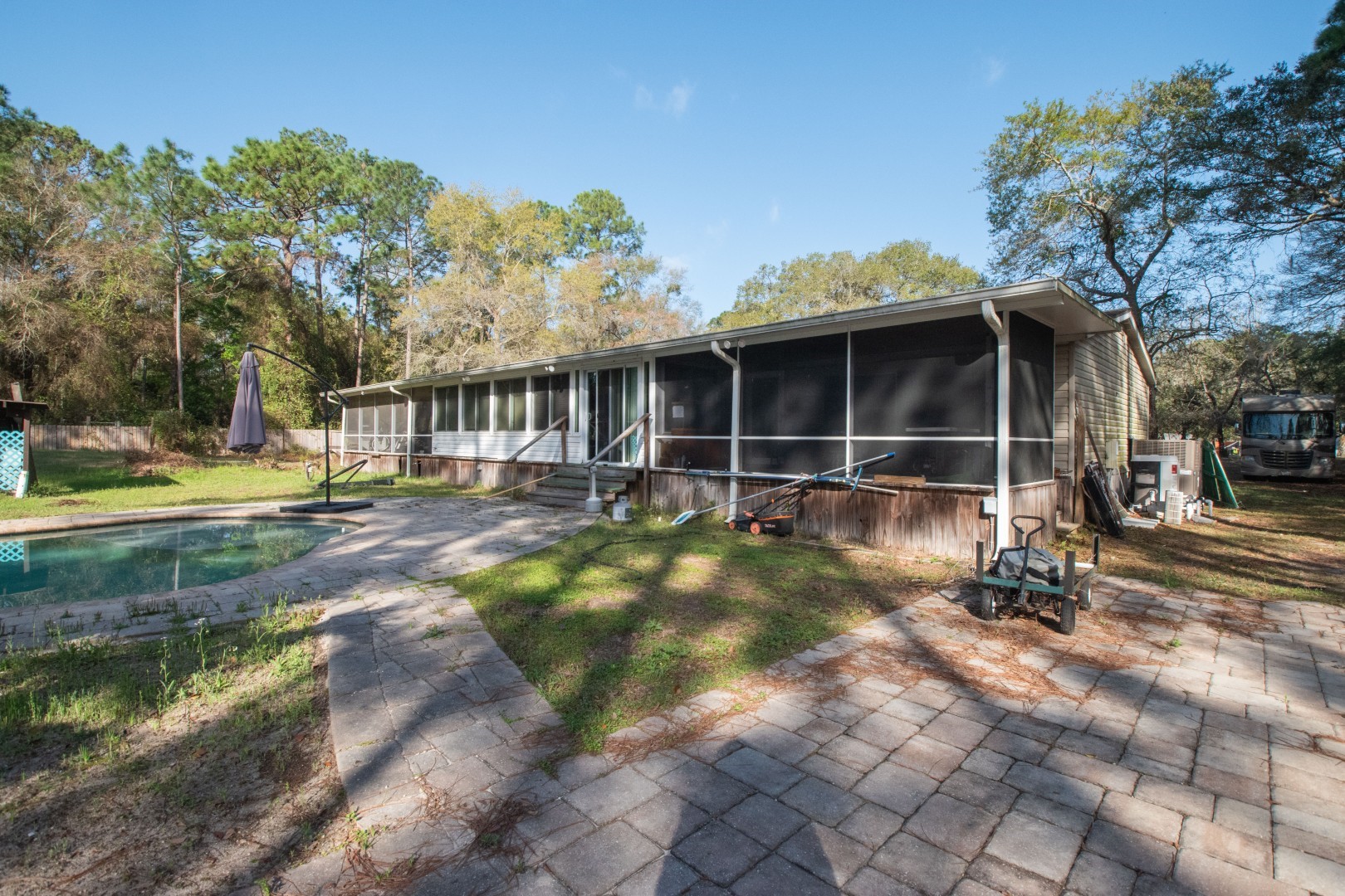 85216 Lina Road Fernandina Beach, FL 32034 - Photo 34 of 47 a view of a house with backyard and sitting area