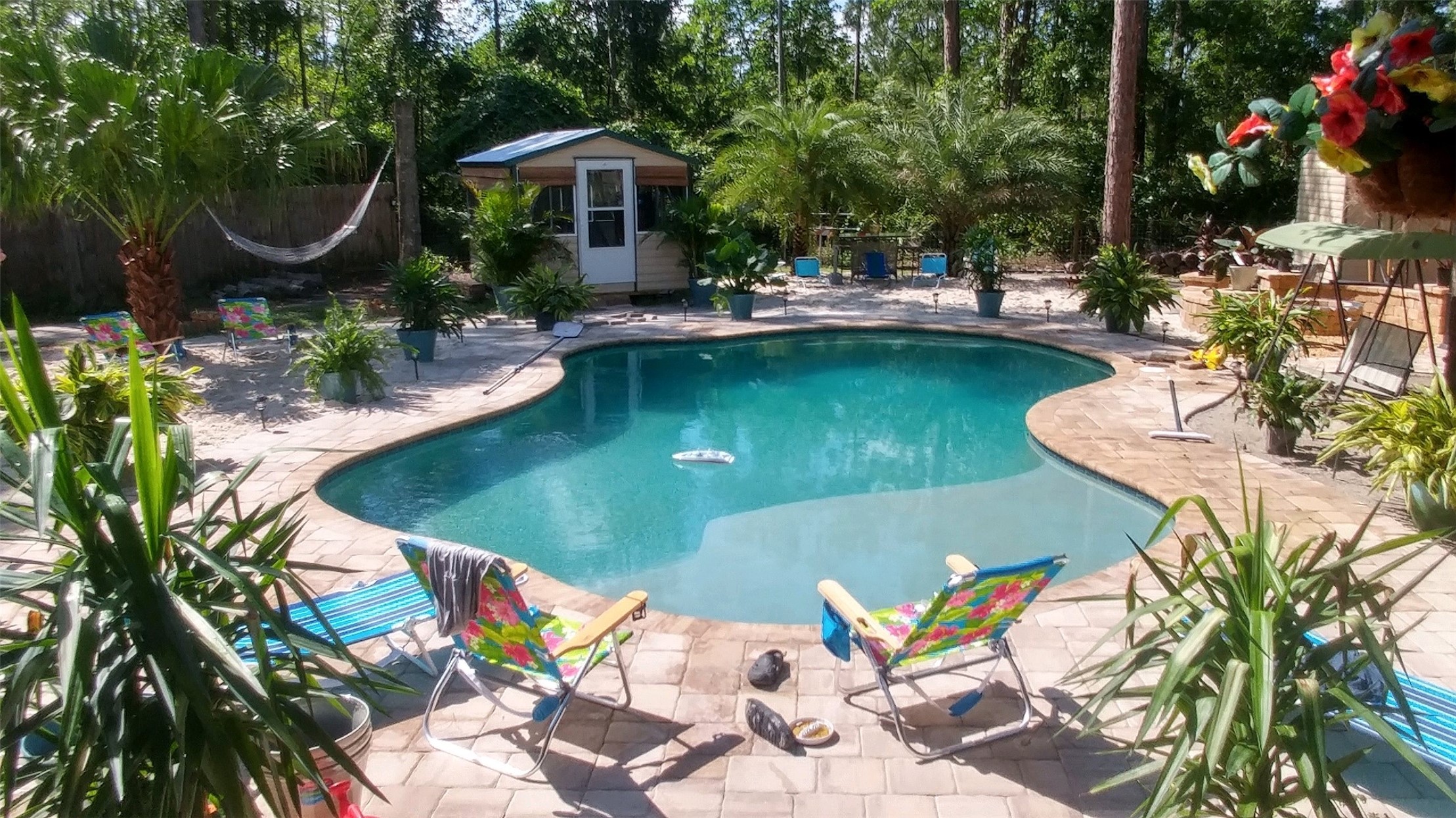 85216 Lina Road Fernandina Beach, FL 32034 - Photo 42 of 47 a view of a house with swimming pool and sitting area