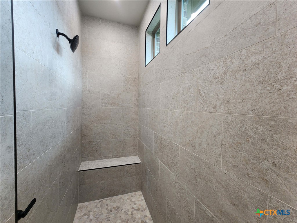 406 Talon Loop Salado, TX 76571 - Photo 23 of 31 a bathroom with a shower