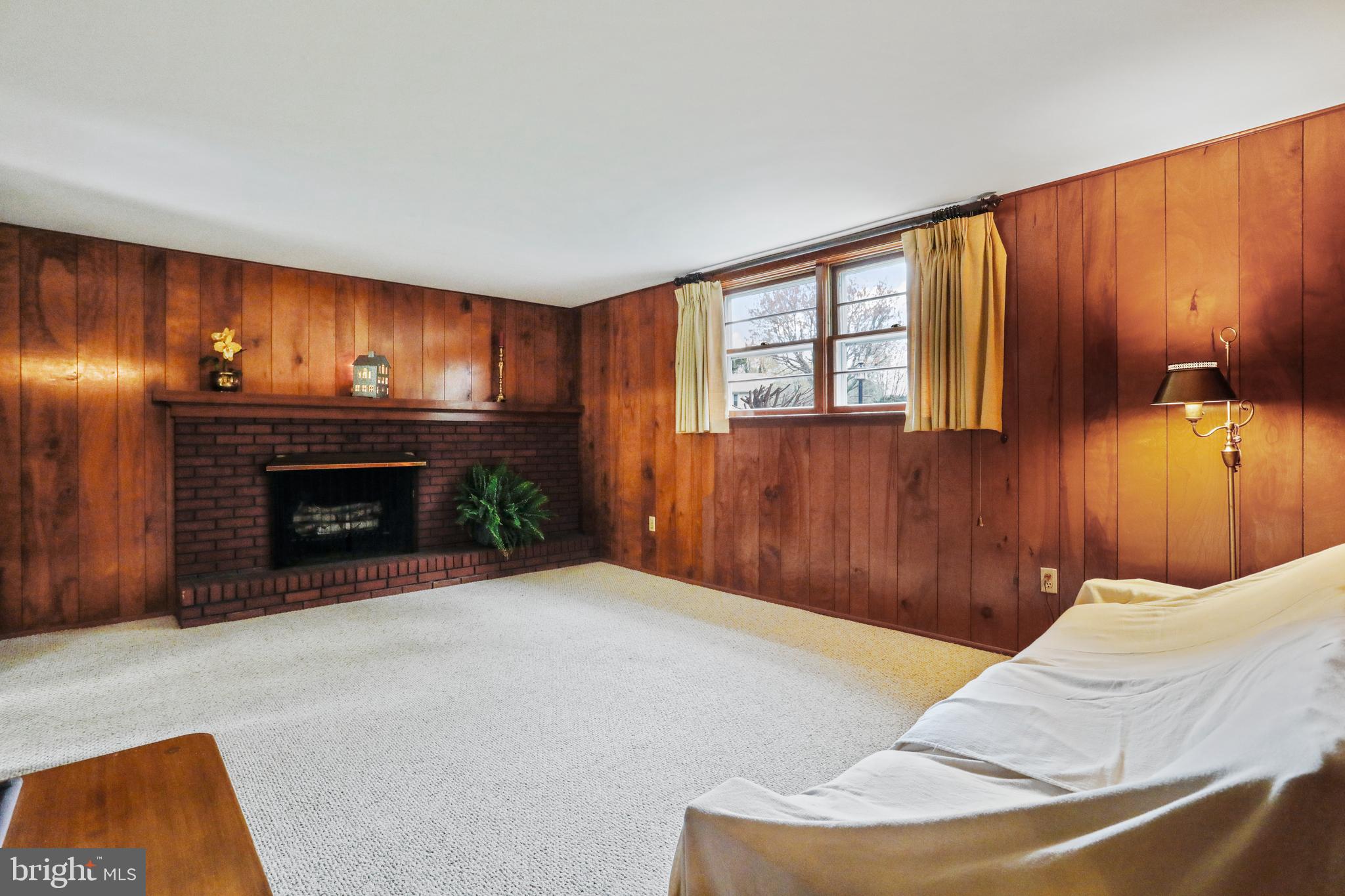 10600 Harry Heth Road Williamsport, MD 21795 - Photo 33 of 52 Family Room with Cozy Natural Grained Paneling...